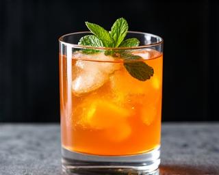 Stylized refreshing cocktail with garnishes